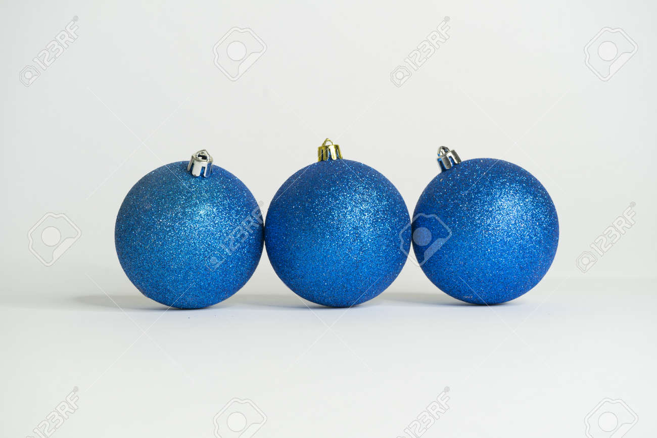 Blue christmas balls with white background - 157694545 Blue christmas balls with white background - 157694545