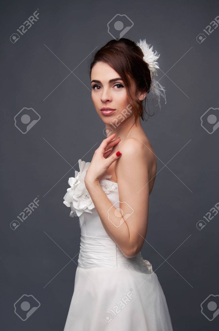 Elegant Bride With Brown Short Hair Updo And Bare Shoulders White