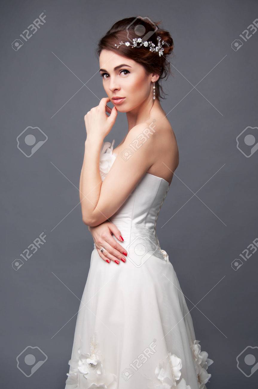 Elegant Bride With Brown Short Hair Updo And Bare Shoulders White