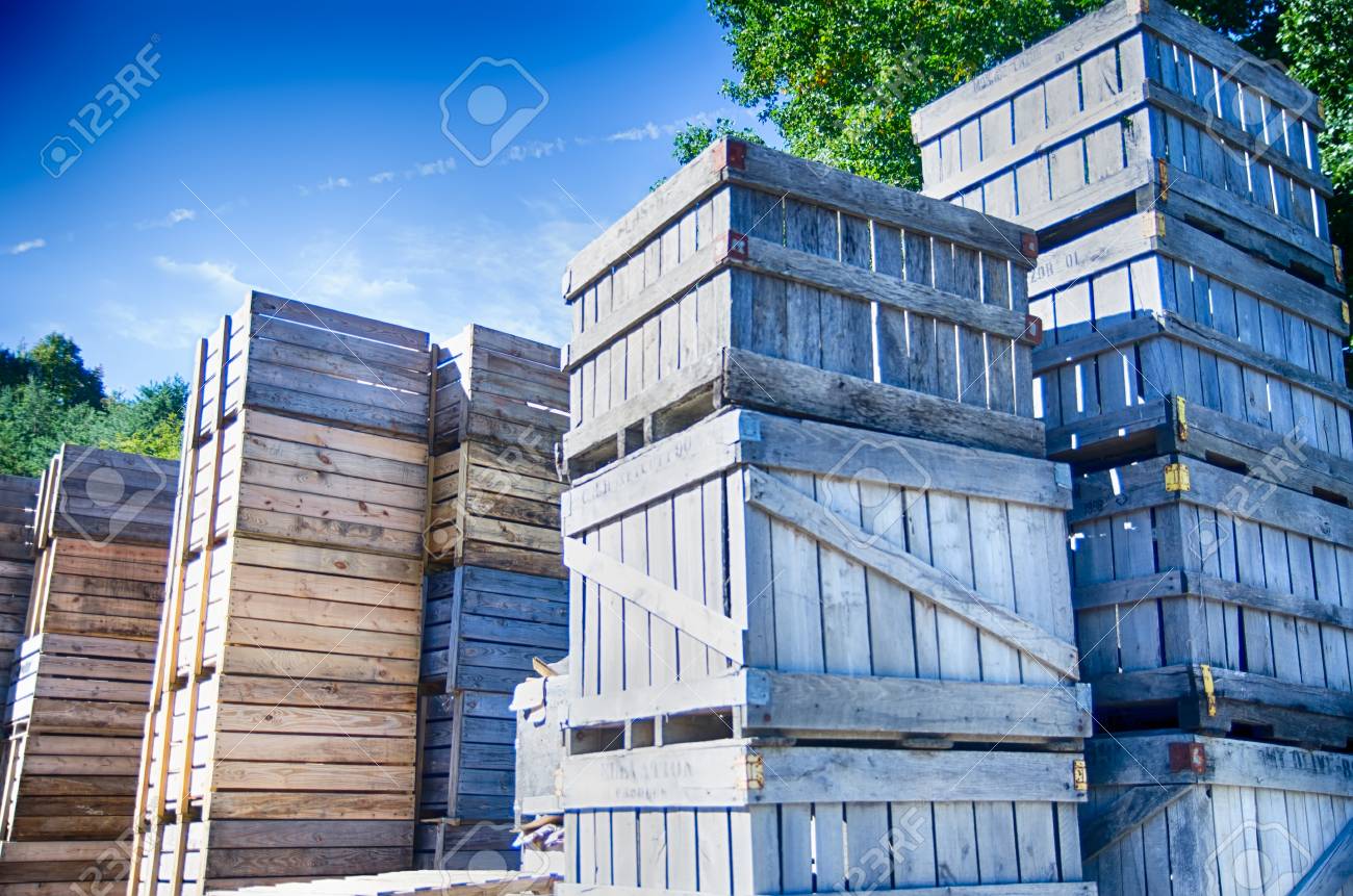 Stack Of Fruit Boxes Or Crates Sit Outside A Warehouse Stock Photo Stack Of Fruit Boxes Or Crates Sit Outside A Warehouse Stock Photo