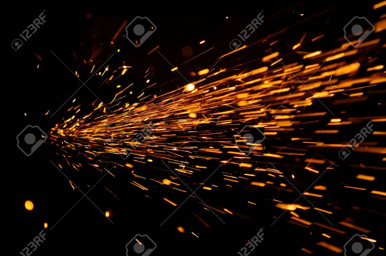 glowing flow of sparks in the dark stock photo picture and royalty