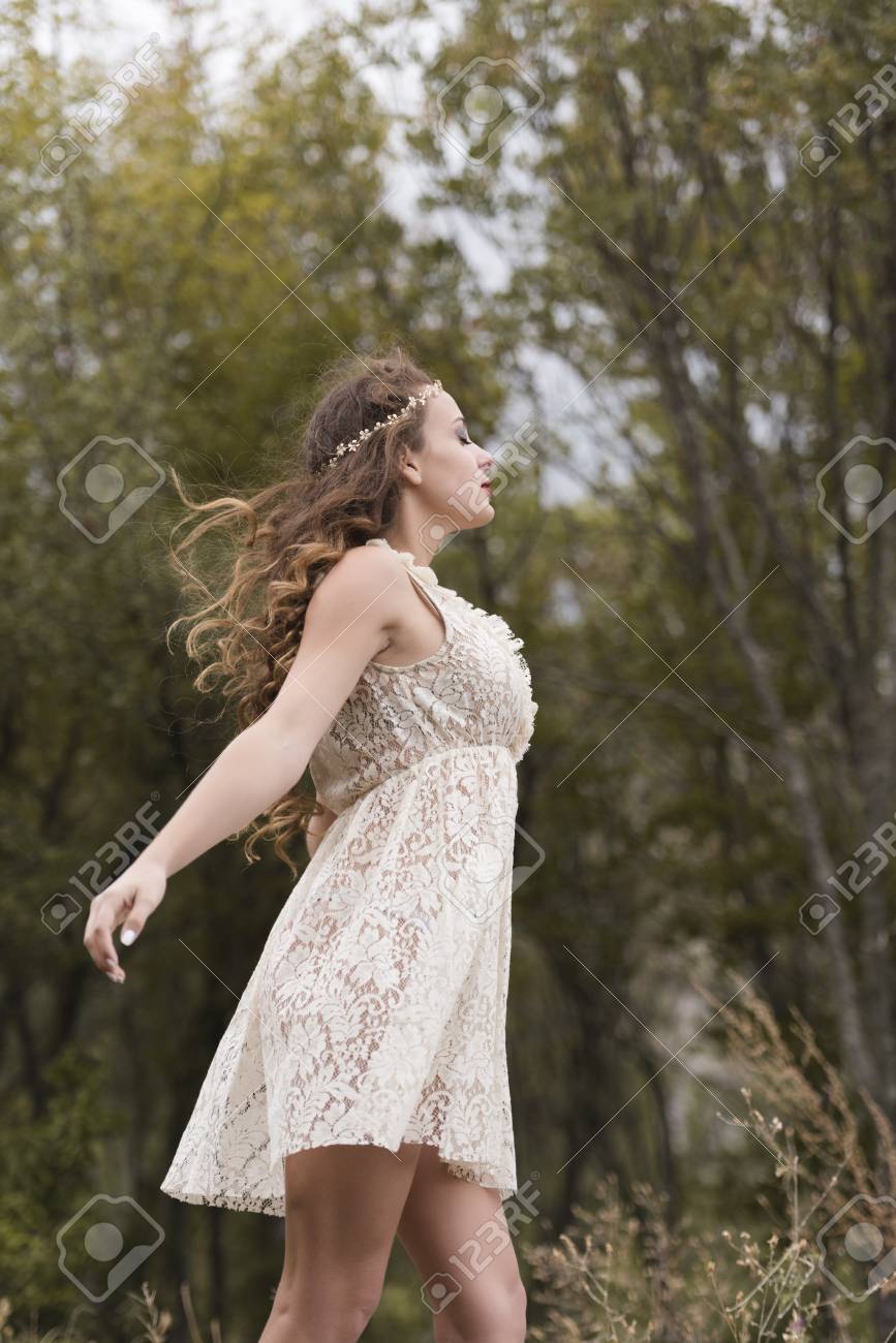 Young Woman With Long Curly Hair Wear Handmade Look Dress With Stock Photo Picture And Royalty Free Image Image 108371839