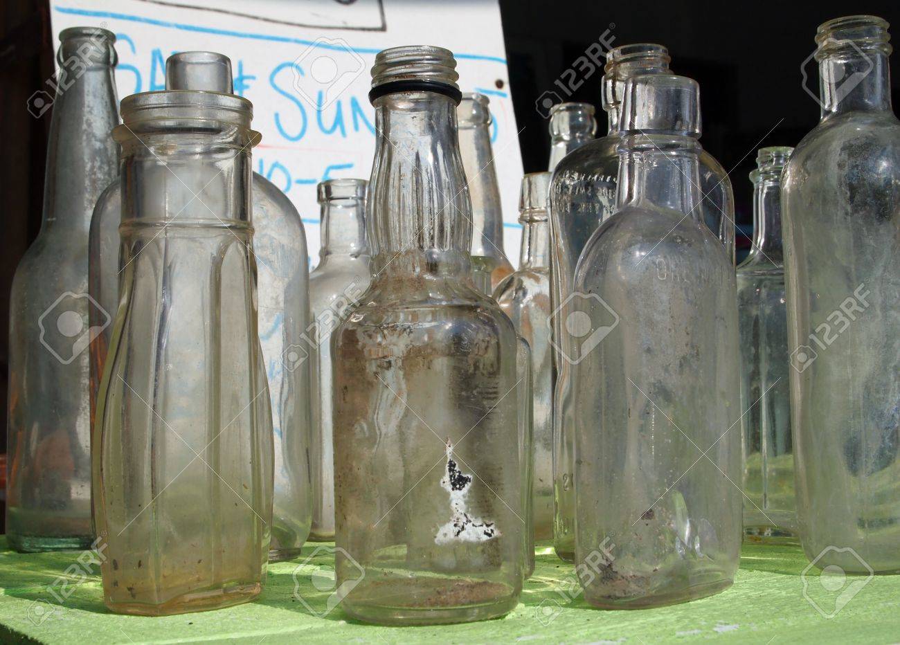 Download A Collection Of Antique Clear Glass Bottles For Sale At A Flea Market Stock Photo Picture And Royalty Free Image Image 18857035