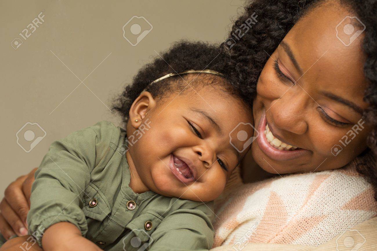 Happy African American mother and her daugher. - 68258589 Happy African American mother and her daugher. - 68258589