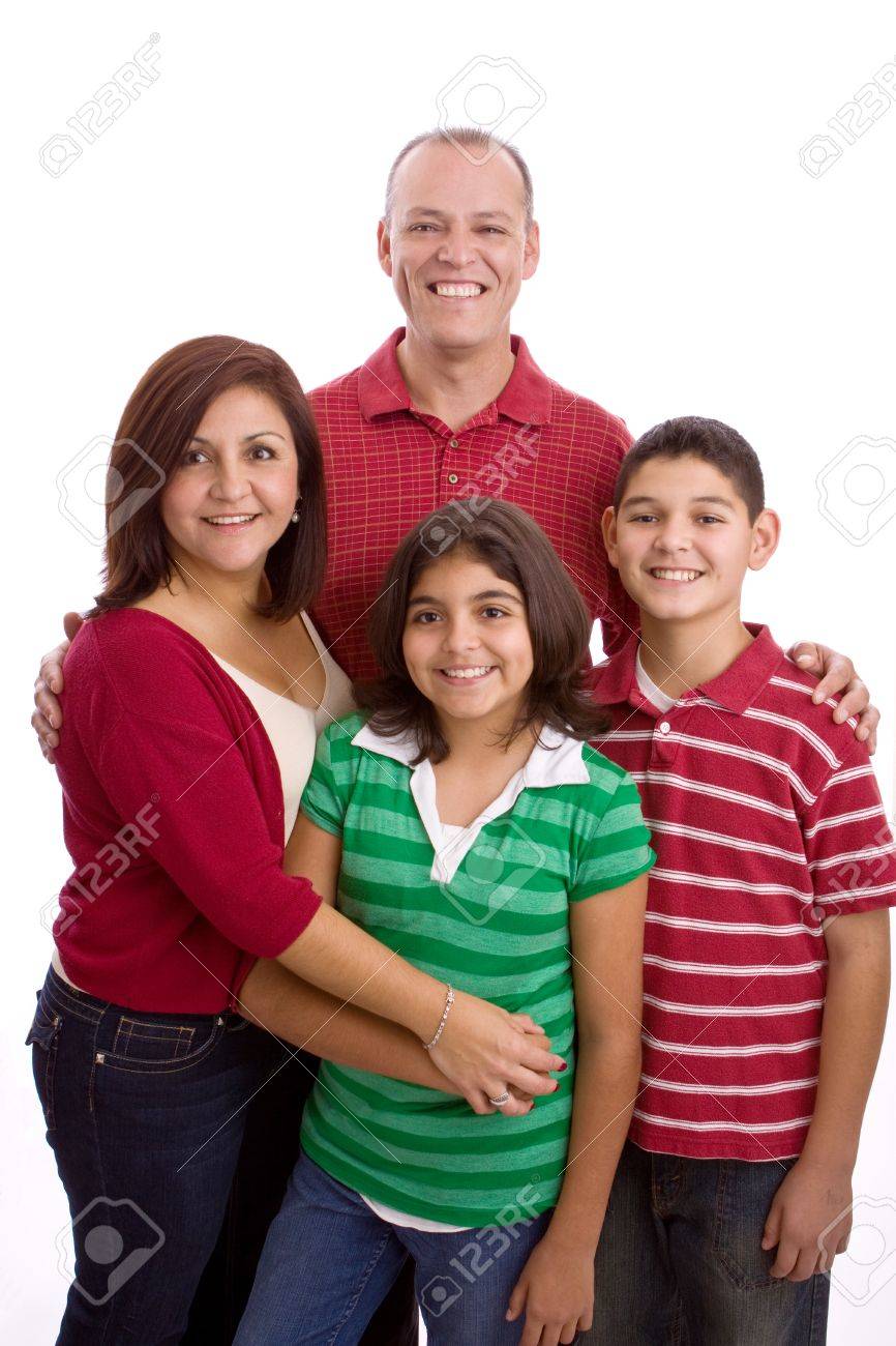 Hispanic Family Smiling Isolated On White. Stock Photo, Picture And Royalty  Free Image. Image 74423115.