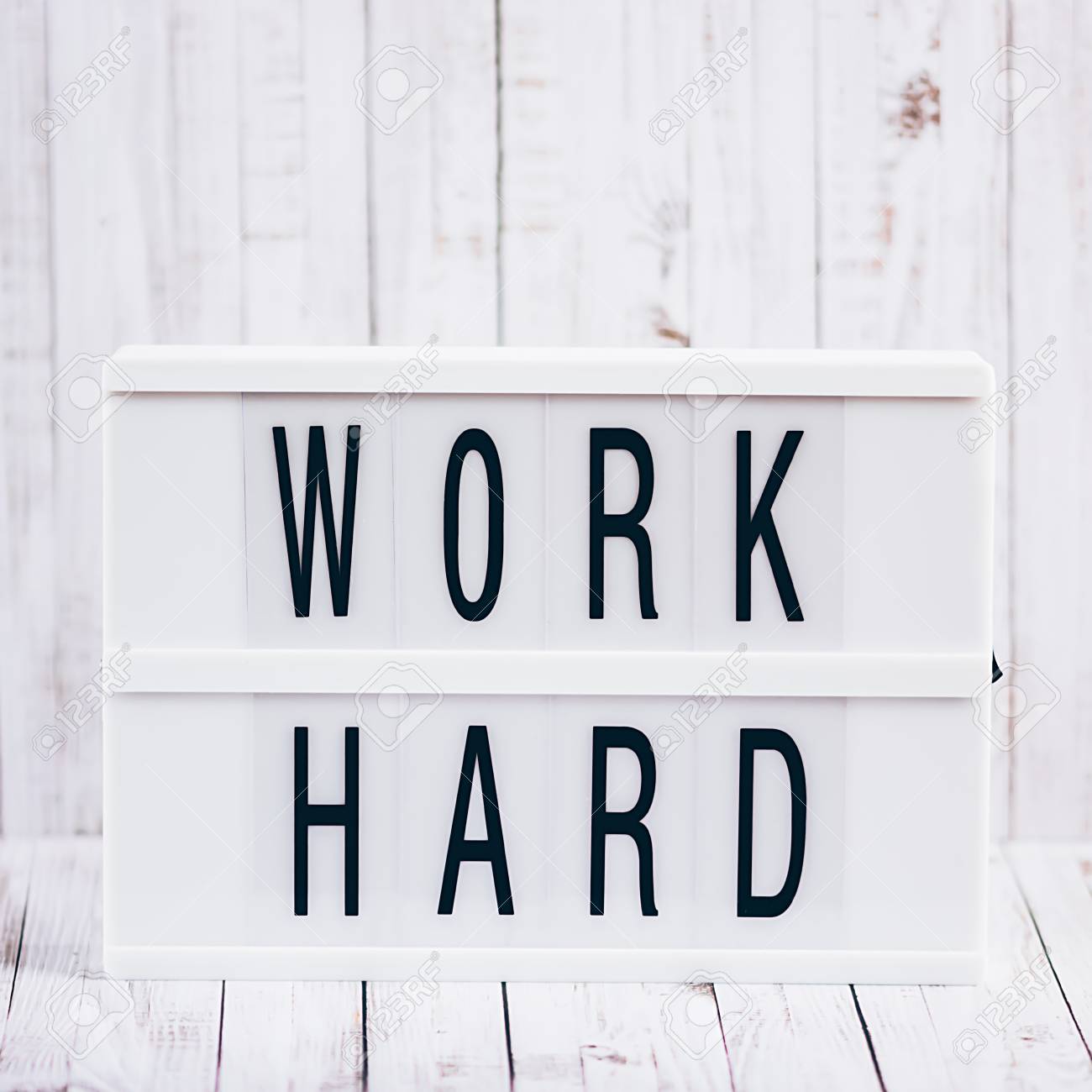 Two Word Inspirational Quotes Lightbox With Powerful, Inspirational And Motivational Two Word Quote, Work  Hard Stock Photo, Picture And Royalty Free Image. Image 117035186.