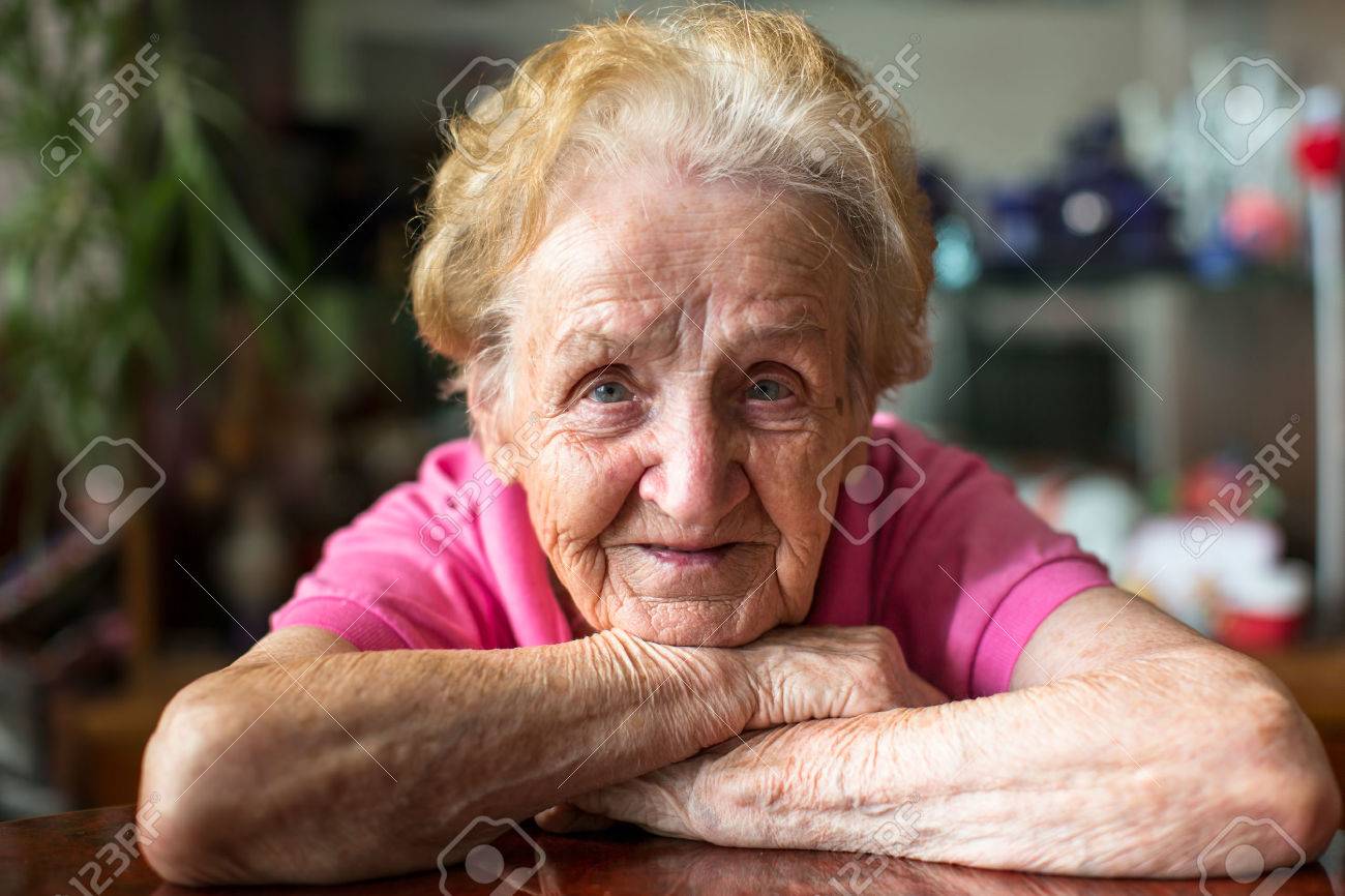Closeup portrait of happy elderly woman. - 45240307 Closeup portrait of happy elderly woman. - 45240307