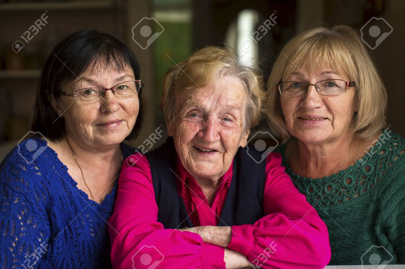 An old woman with two adult daughters. - 50736170 An old woman with two adult daughters. - 50736170