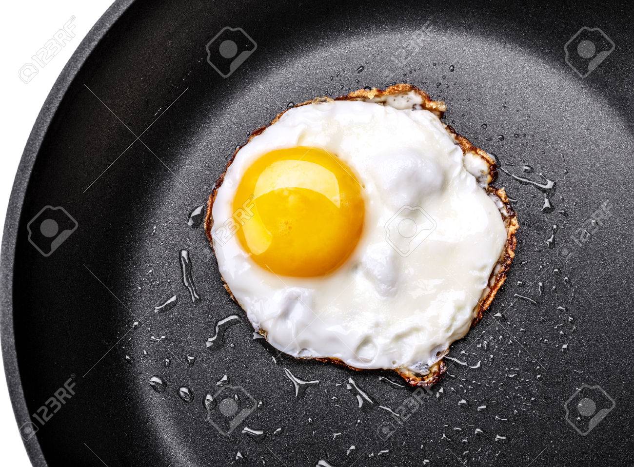 fried one egg in a frying pan stock photo picture and royalty free