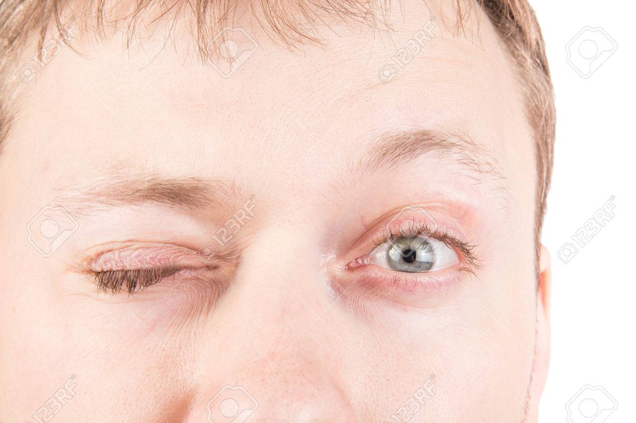 man s blinking gray eyes close up stock photo picture and royalty