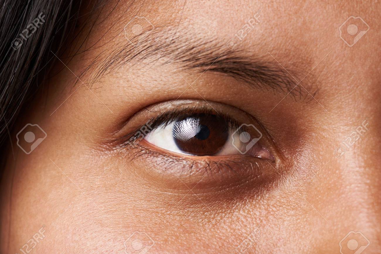Macro of woman dark brown eye without cosmetic or makeup - 69680594 Macro of woman dark brown eye without cosmetic or makeup - 69680594