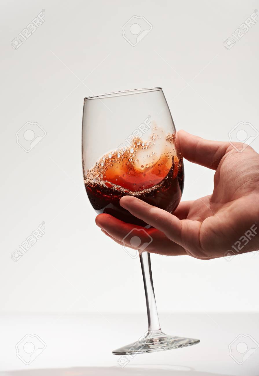 Wine Glass In Human Hand Isolated On White Background Celebration