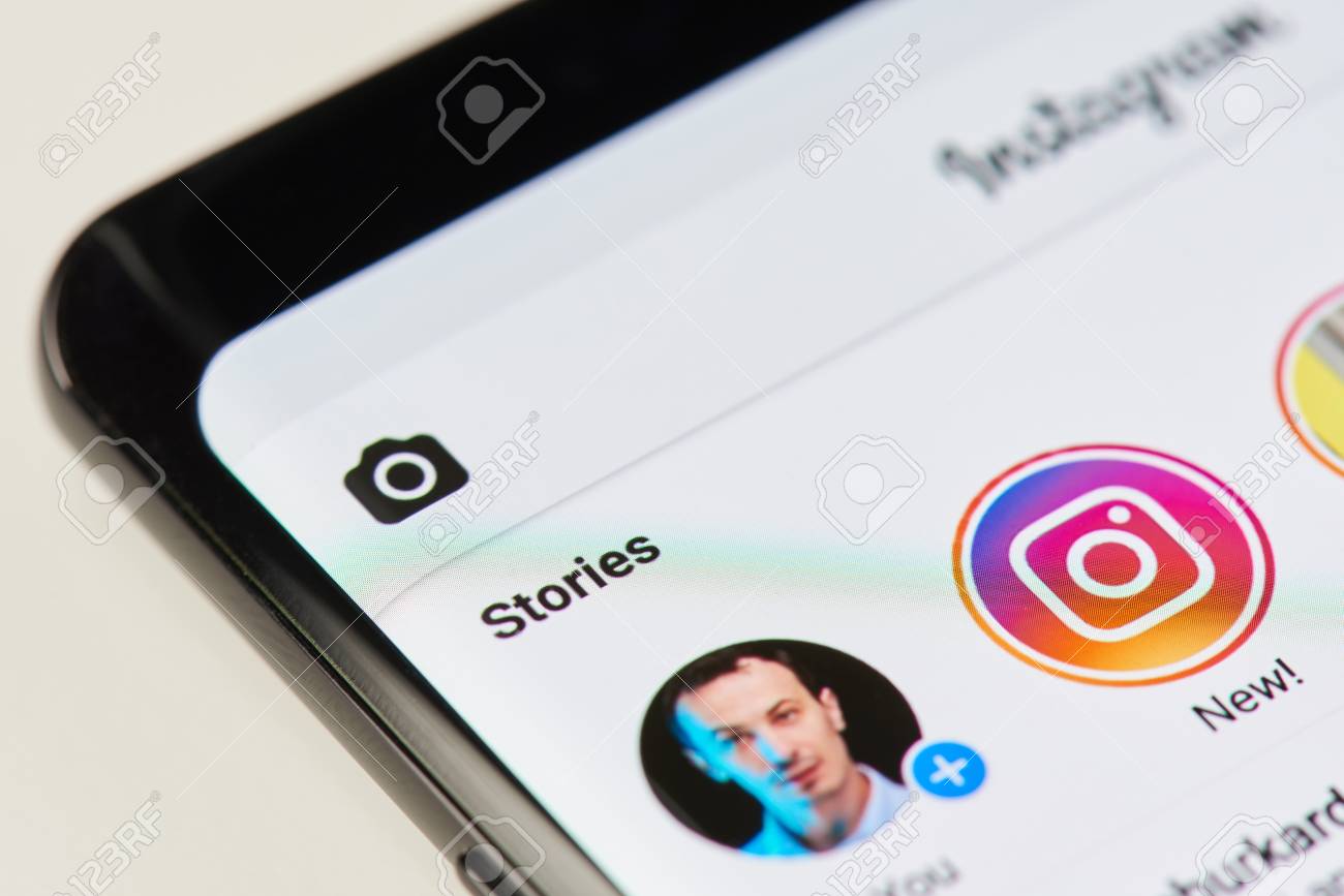 New york, USA - April 11, 2018: Adding new story on instagram app close-up view of smartphone screen - 101834914 New york, USA - April 11, 2018: Adding new story on instagram app close-up view of smartphone screen - 101834914
