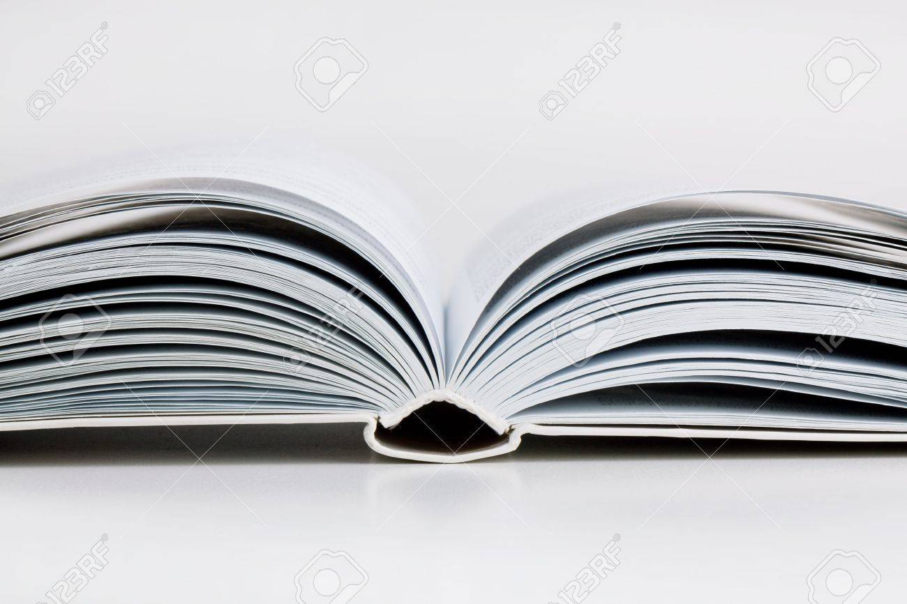 pages open a thick book on white background stock photo picture and