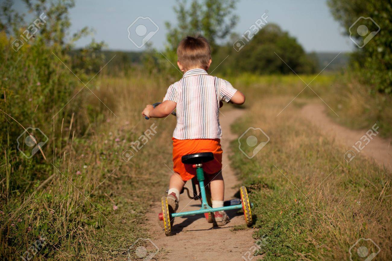 little boy tricycle