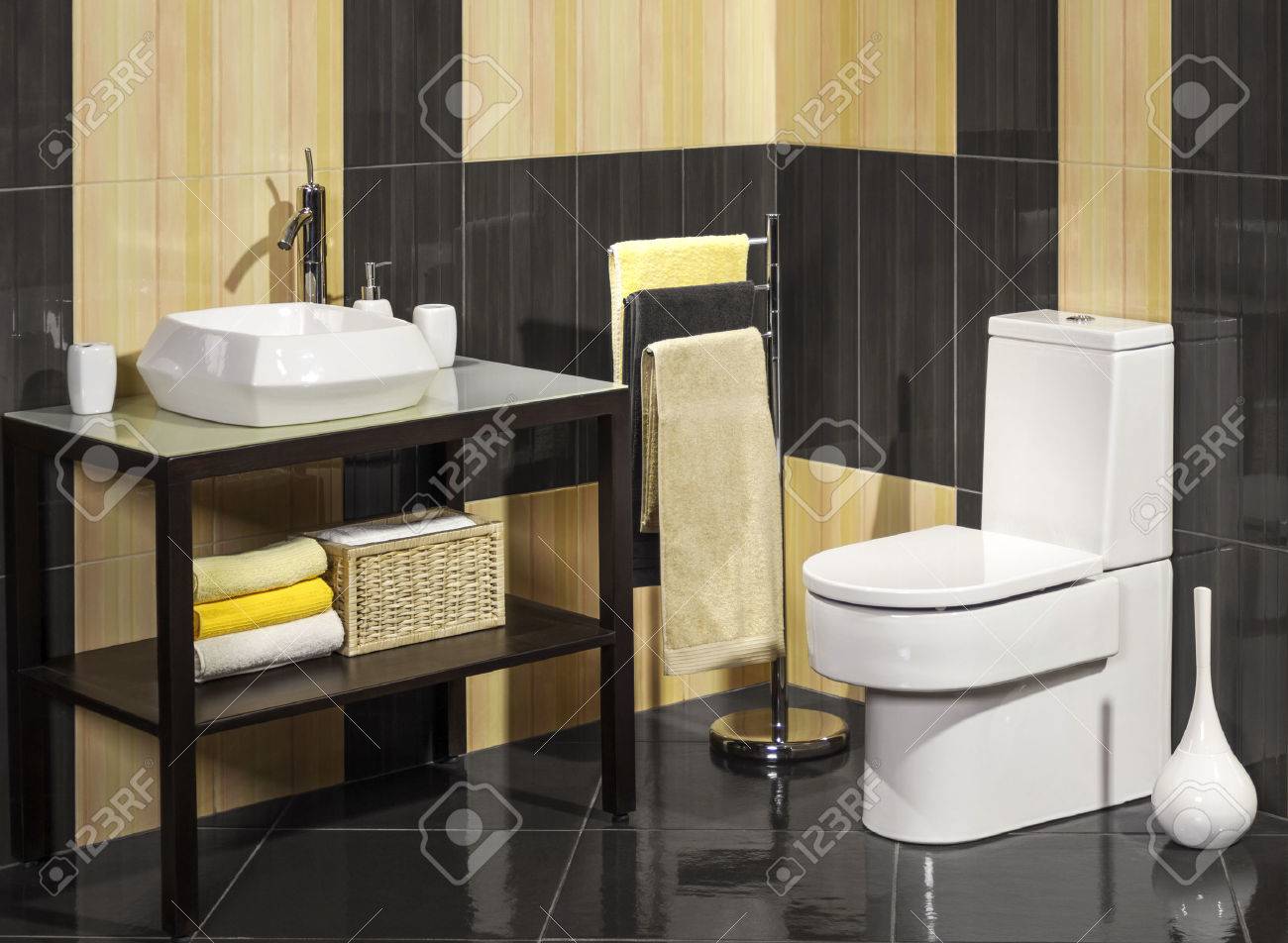 Detail of a modern bathroom with sink and toilet - 41475558 Detail of a modern bathroom with sink and toilet - 41475558