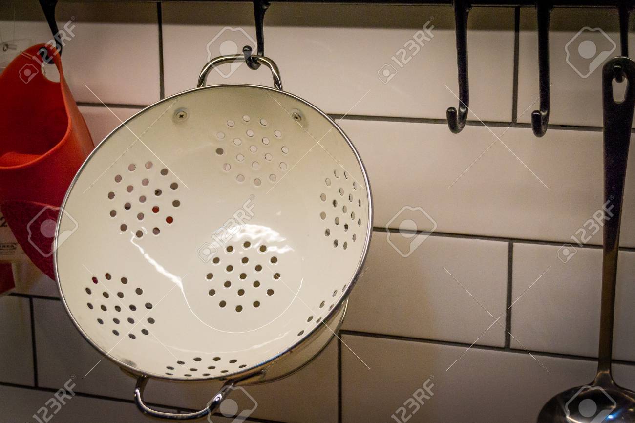 white metal colander