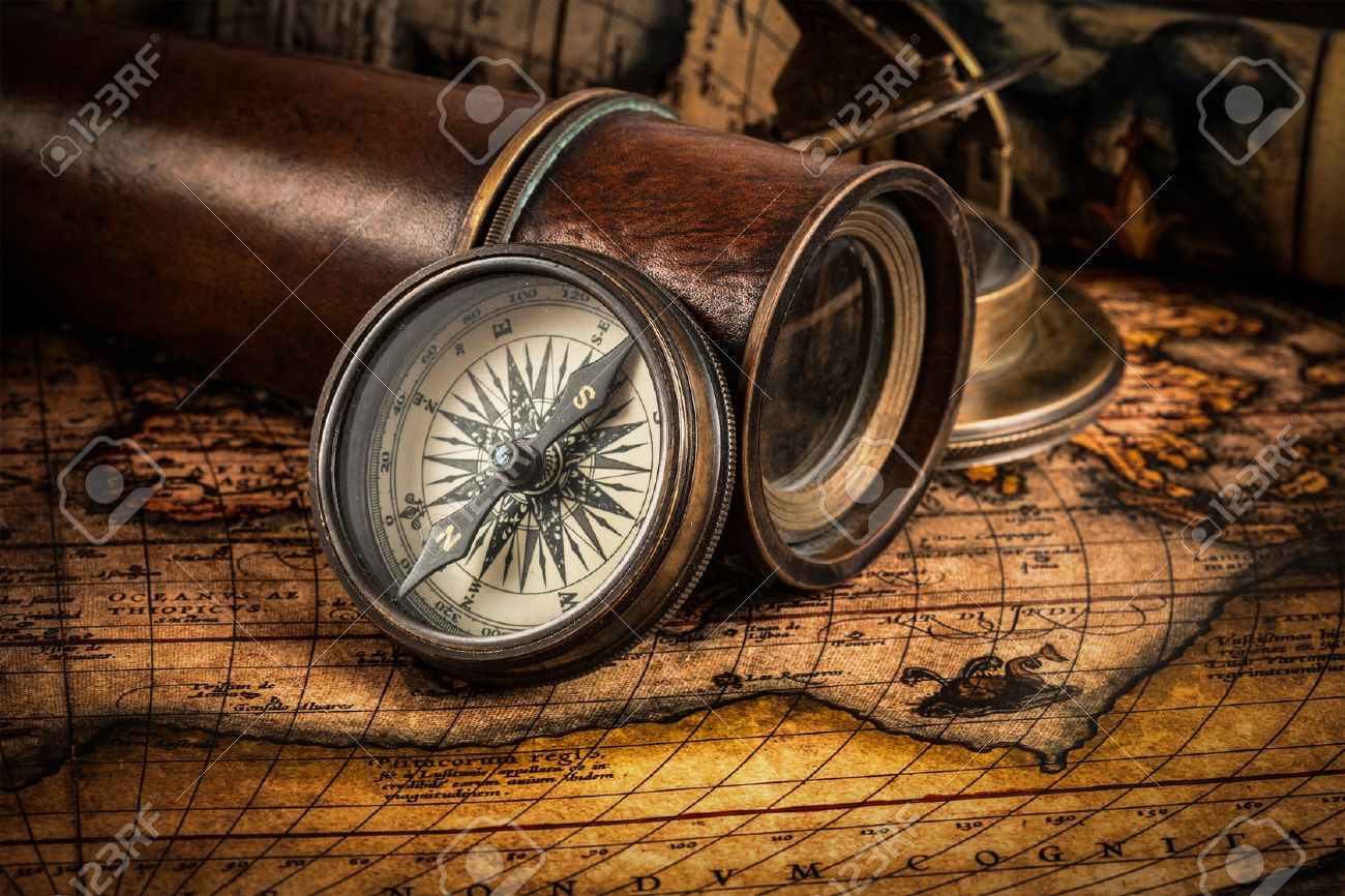 Travel geography navigation concept background - old vintage retro compass with sundial, spyglass and rope on ancient world map - 43579305 Travel geography navigation concept background - old vintage retro compass with sundial, spyglass and rope on ancient world map - 43579305