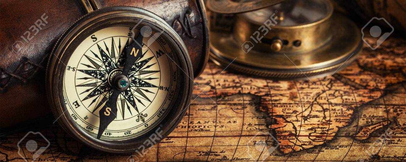 Travel geography navigation concept background - letterbox panorama of old vintage retro compass with sundial, spyglass and rope on ancient world map - 47057746 Travel geography navigation concept background - letterbox panorama of old vintage retro compass with sundial, spyglass and rope on ancient world map - 47057746