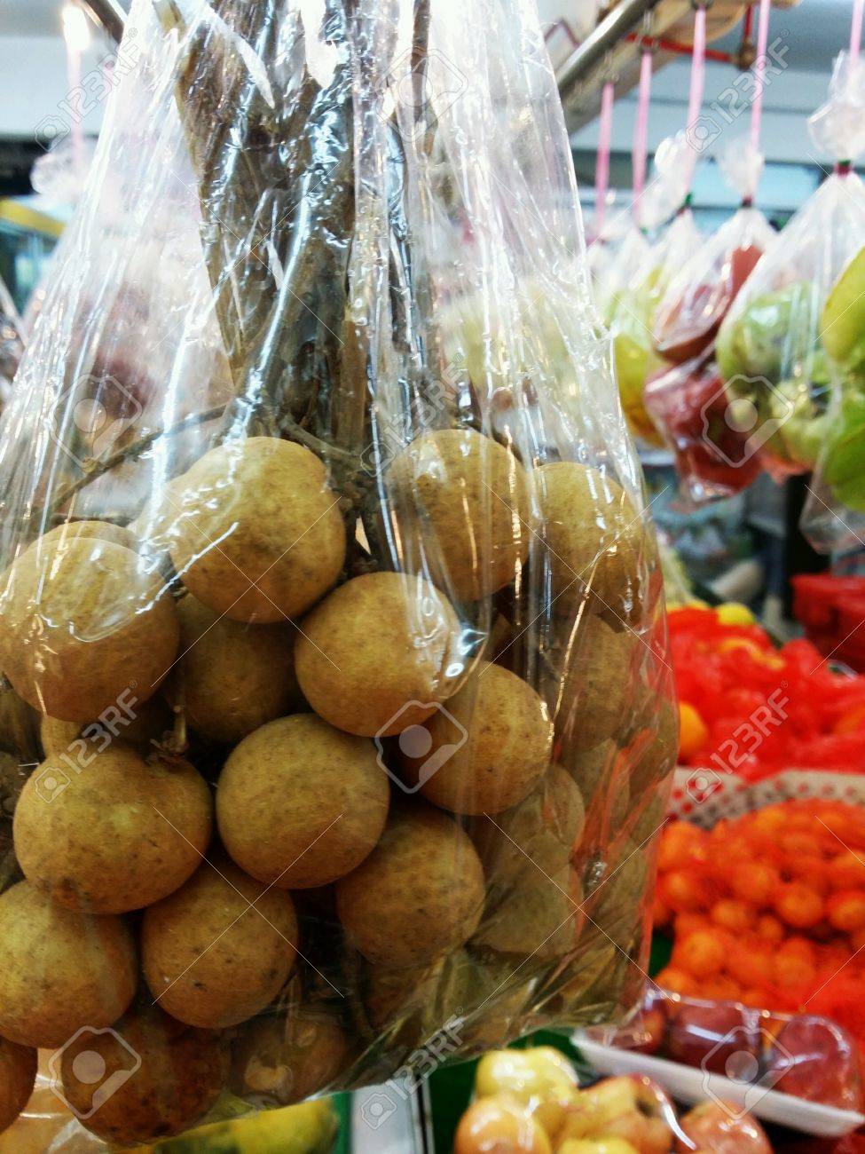 Fresh Longan Or Mata Kucing Fruits In Plastic Hanged For Retail Stock Photo Picture And Royalty Free Image Image 24699212