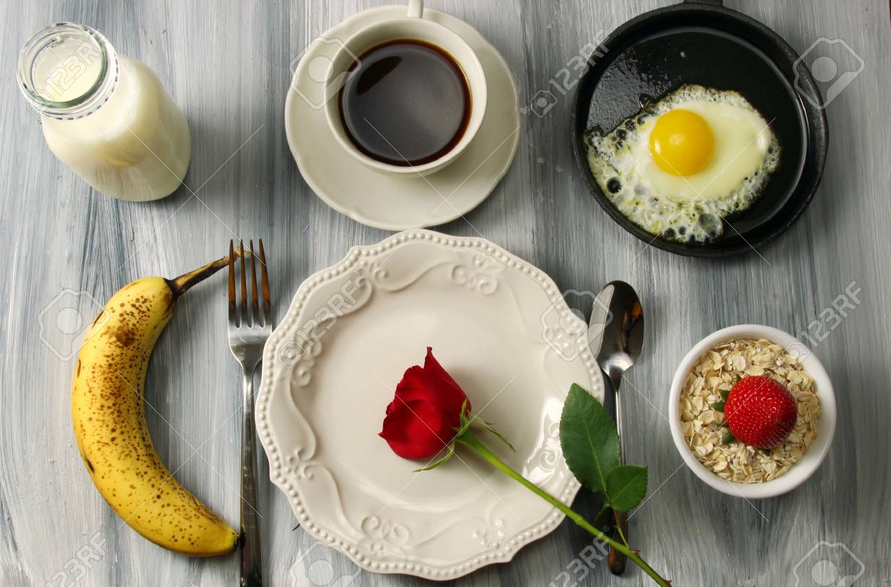 Overhead View Of A Romantic Breakfast Table Setting With Milk ... Overhead View Of A Romantic Breakfast Table Setting With Milk ...