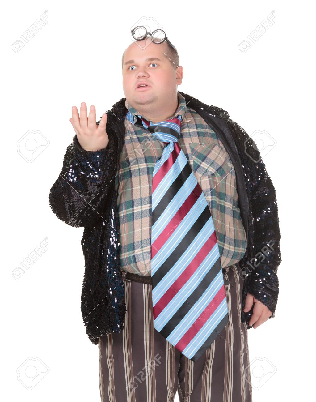 Fun Portrait Of An Obese Man With An Outrageous Fashion Sense Wearing A  Mixture Of Stripes, Checks And Spangles Topped By An Oversized Flamboyant  Tie, On White Stock Photo, Picture and Royalty
