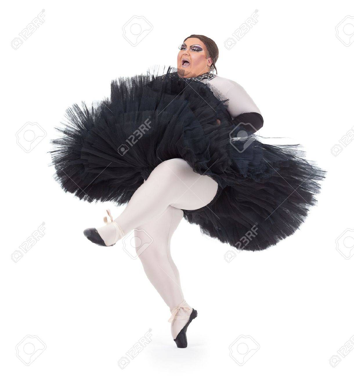 21398963-Overweight-drag-queen-dancing-in-a-tutu-nimbly-balancing-on-tiptoe--Stock-Photo.jpg