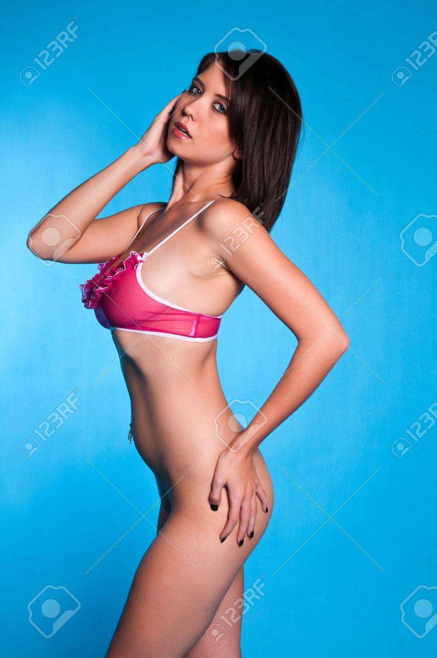 Beautiful Young Brunette Bottomless In A Pink Bra Stock Photo, Picture and  Royalty Free Image. Image 11917102.