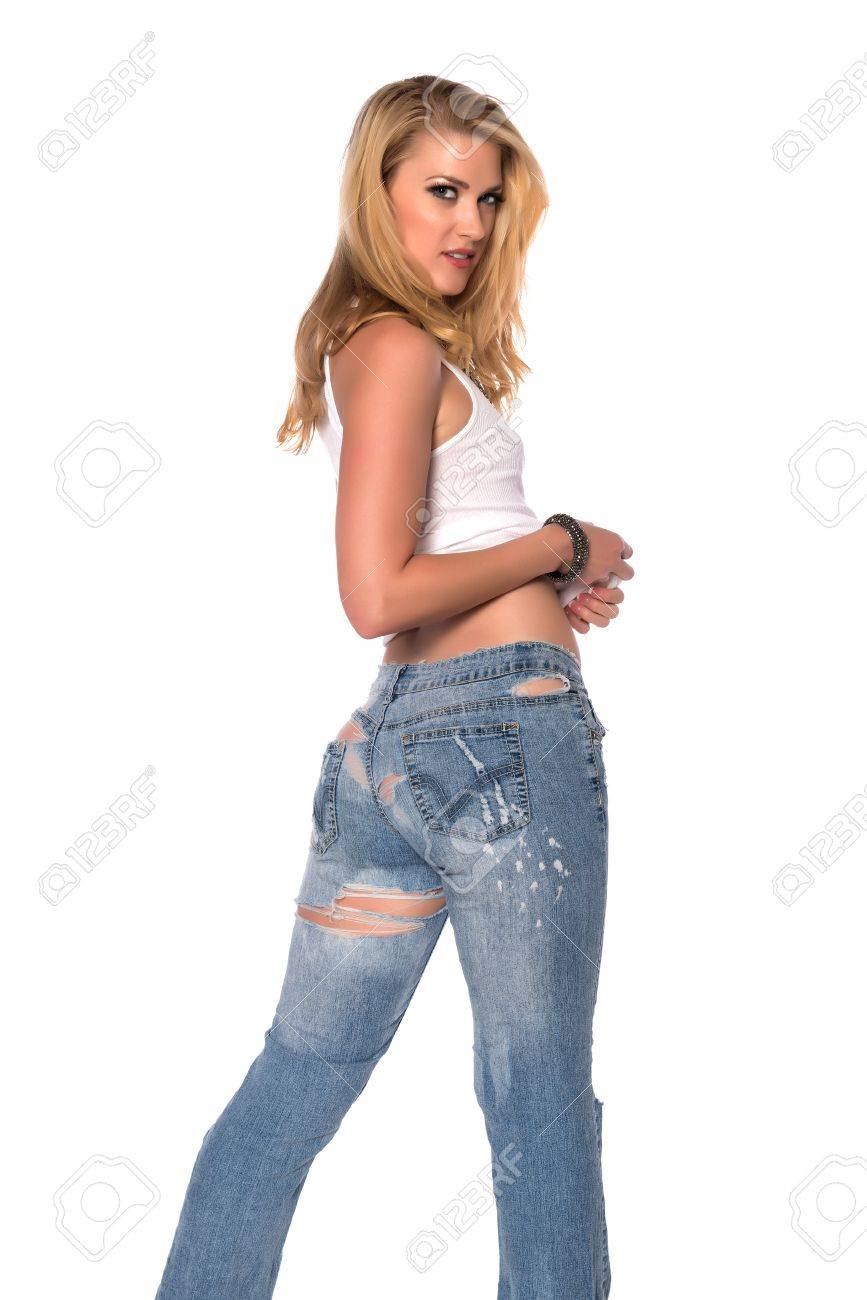スレンダー金髪美女白のトップとジーンズで の写真素材 画像素材 Image