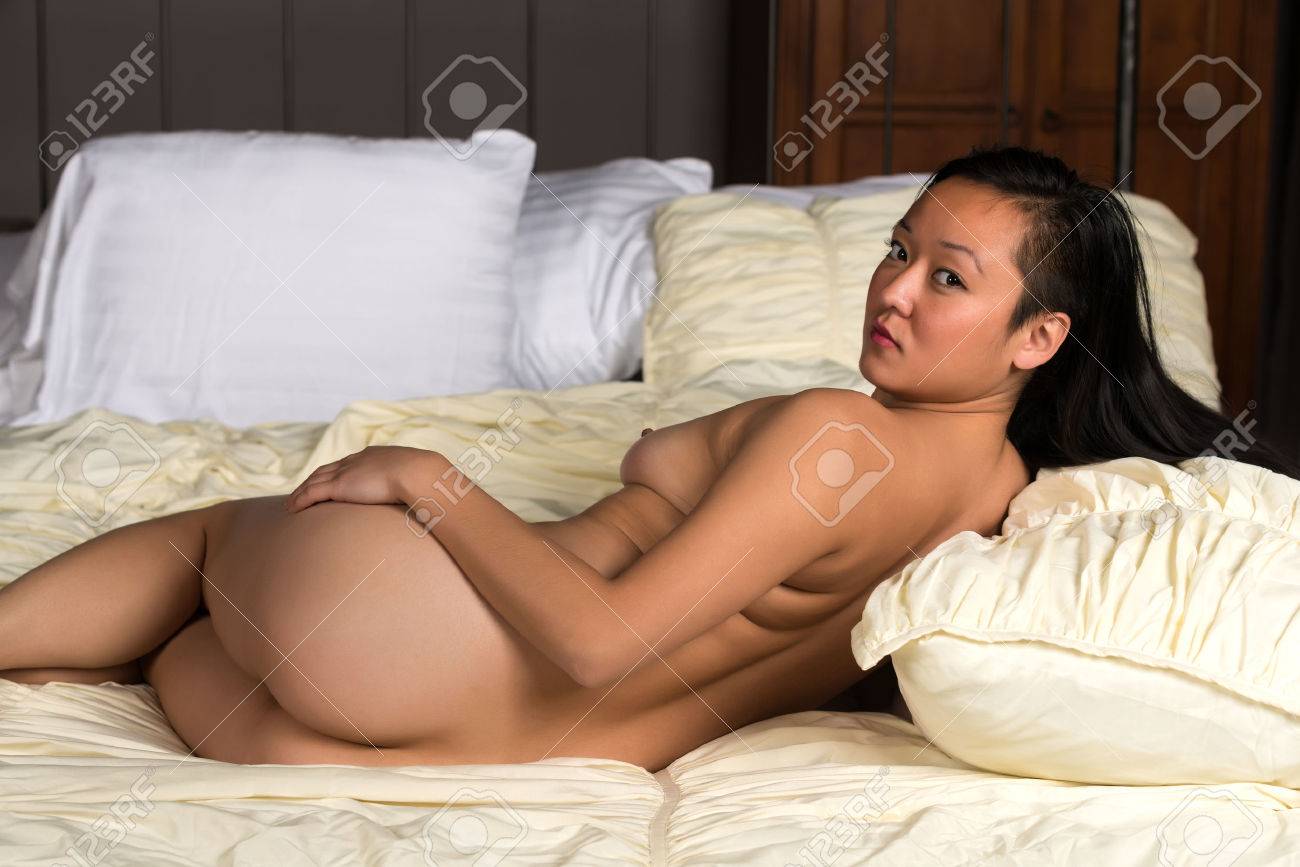 lying naked on the Sexy tan asses