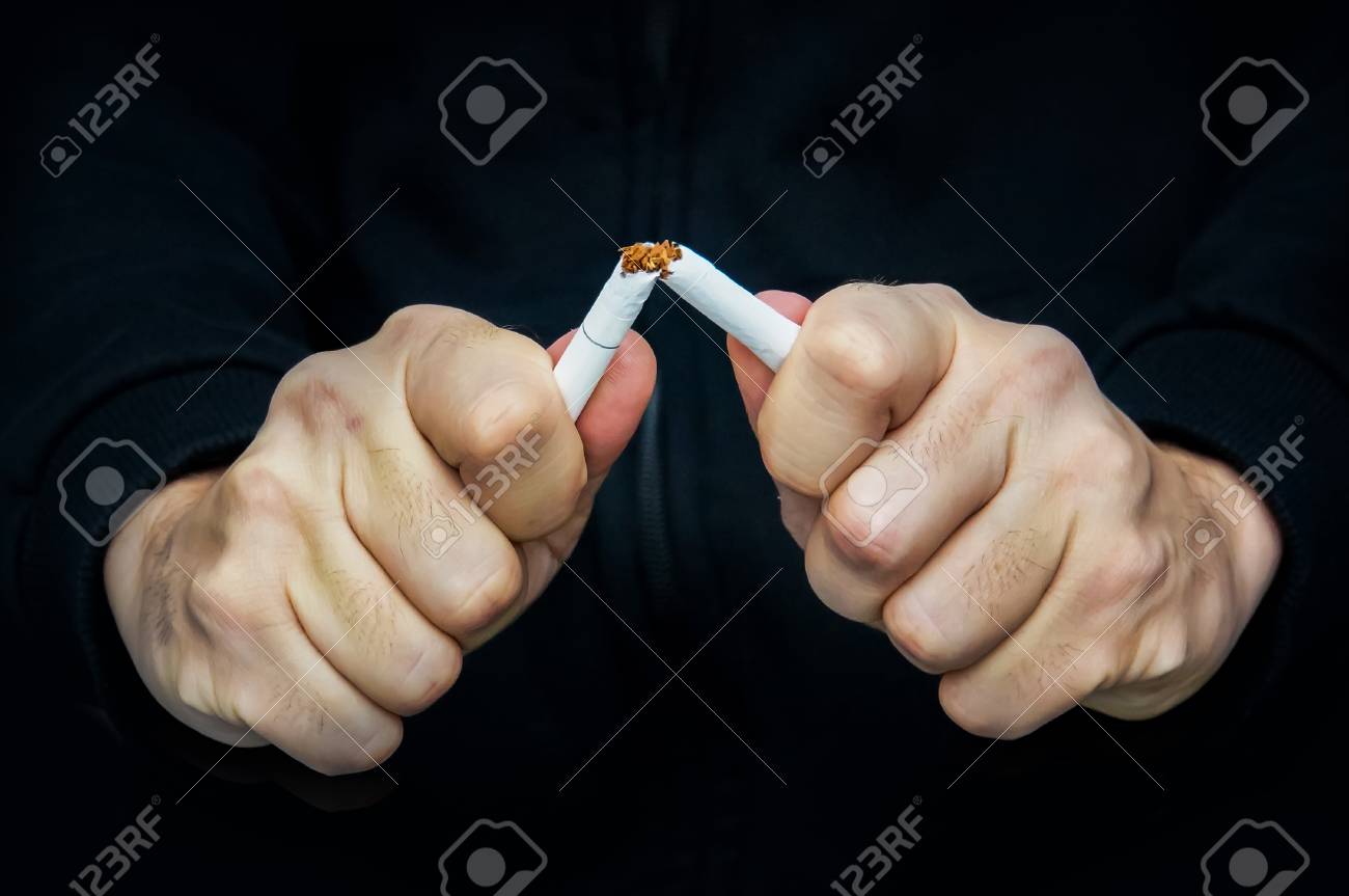 breake down cigarette quitting from addiction concept guy breaks breake