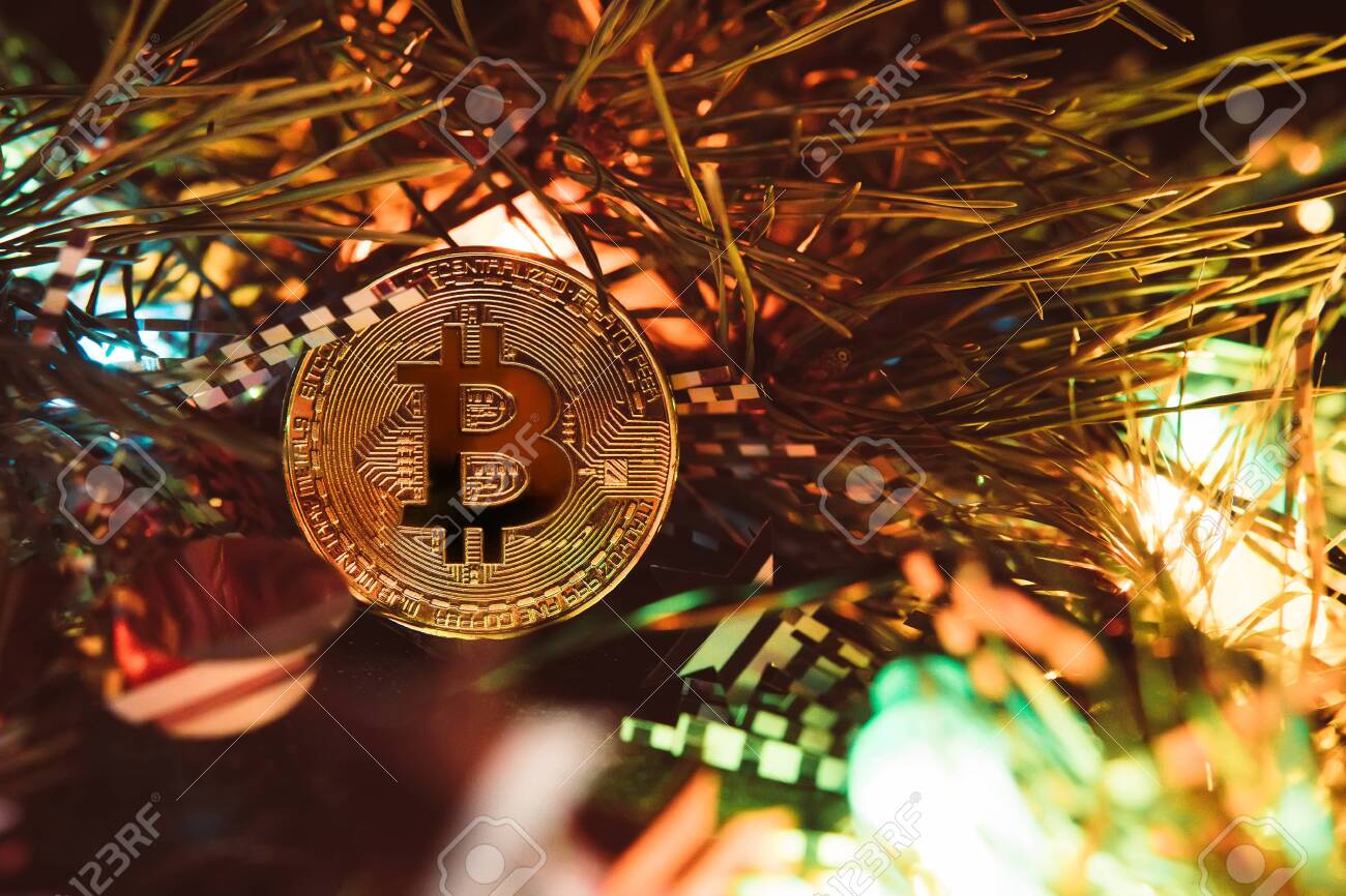 Gold Bitcoin. Crypto Currency Bitcoin On A Christmas Background Stock  Photo, Picture and Royalty Free Image. Image 133671188.
