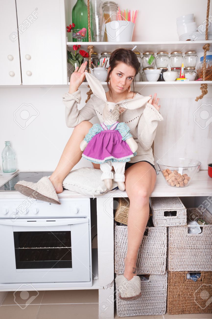 Funny Sexy Woman In The White Kitchen image