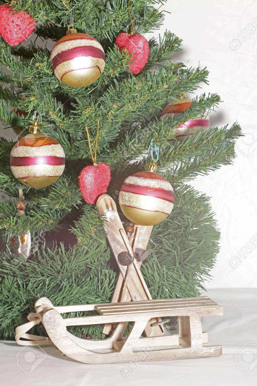 Old Wooden Sled With Vintage Christmas Decorations Stock Photo