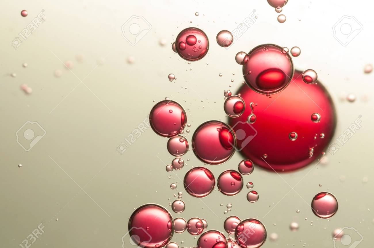 red air bubbles float toward the water surface bubbles float