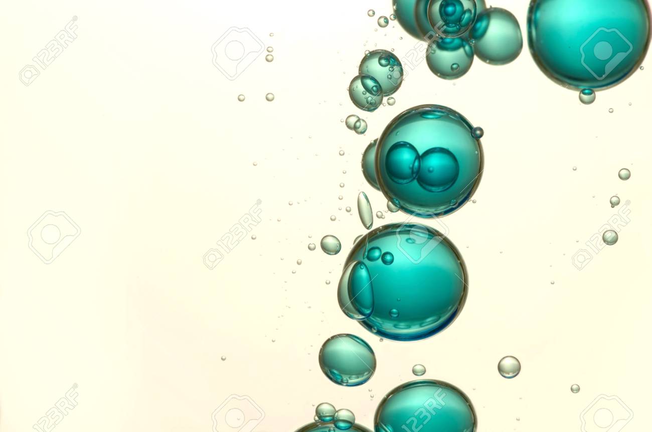 blue air bubbles float over a light background bubbles float
