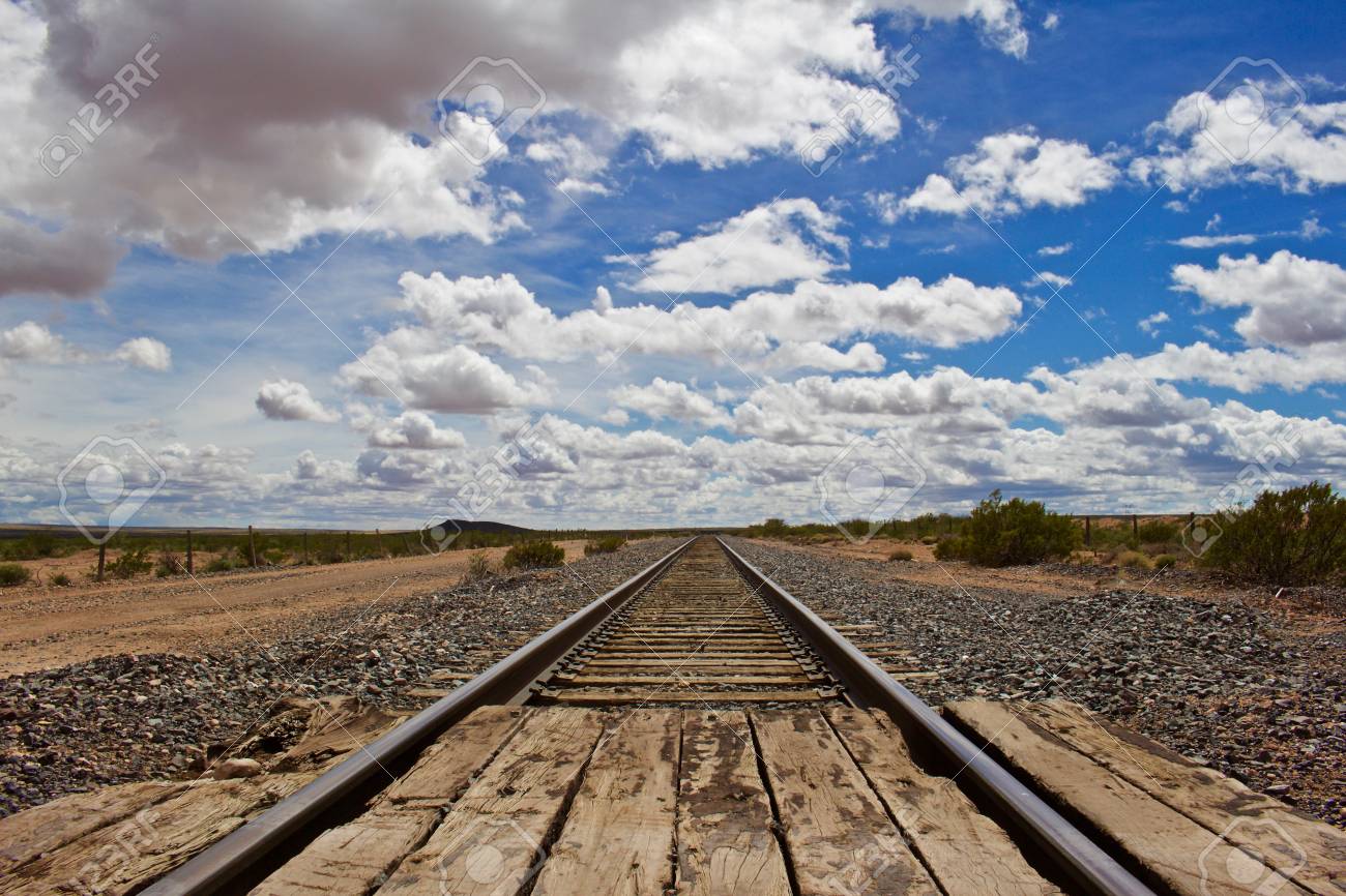 88600079-train-tracks-to-horizon-from-low-perspective.jpg