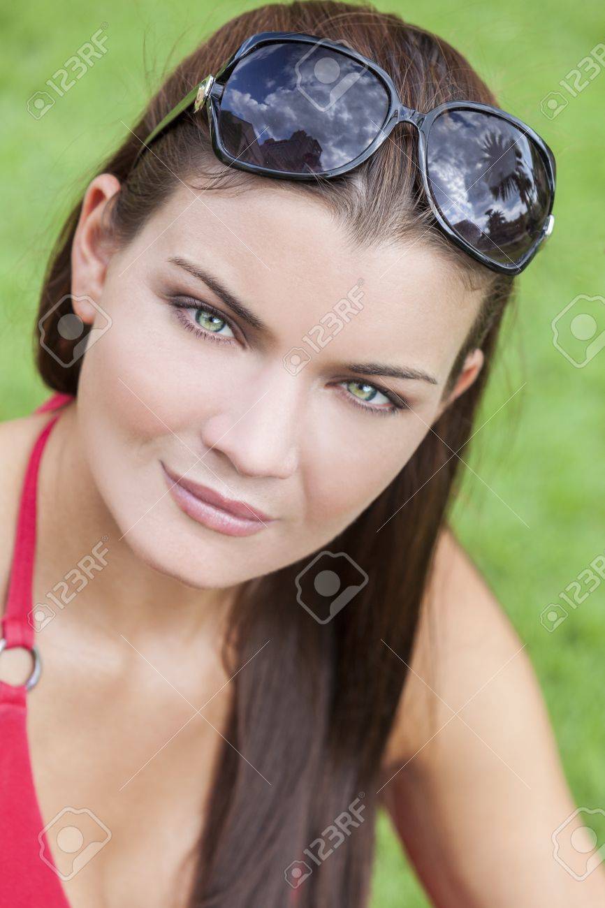 Portrait Of A Beautiful Brunette Young Woman With Stunning Green Eyes, Shot  Outside In Natural Light Stock Photo, Picture and Royalty Free Image. Image  15063826., image size:866x1300