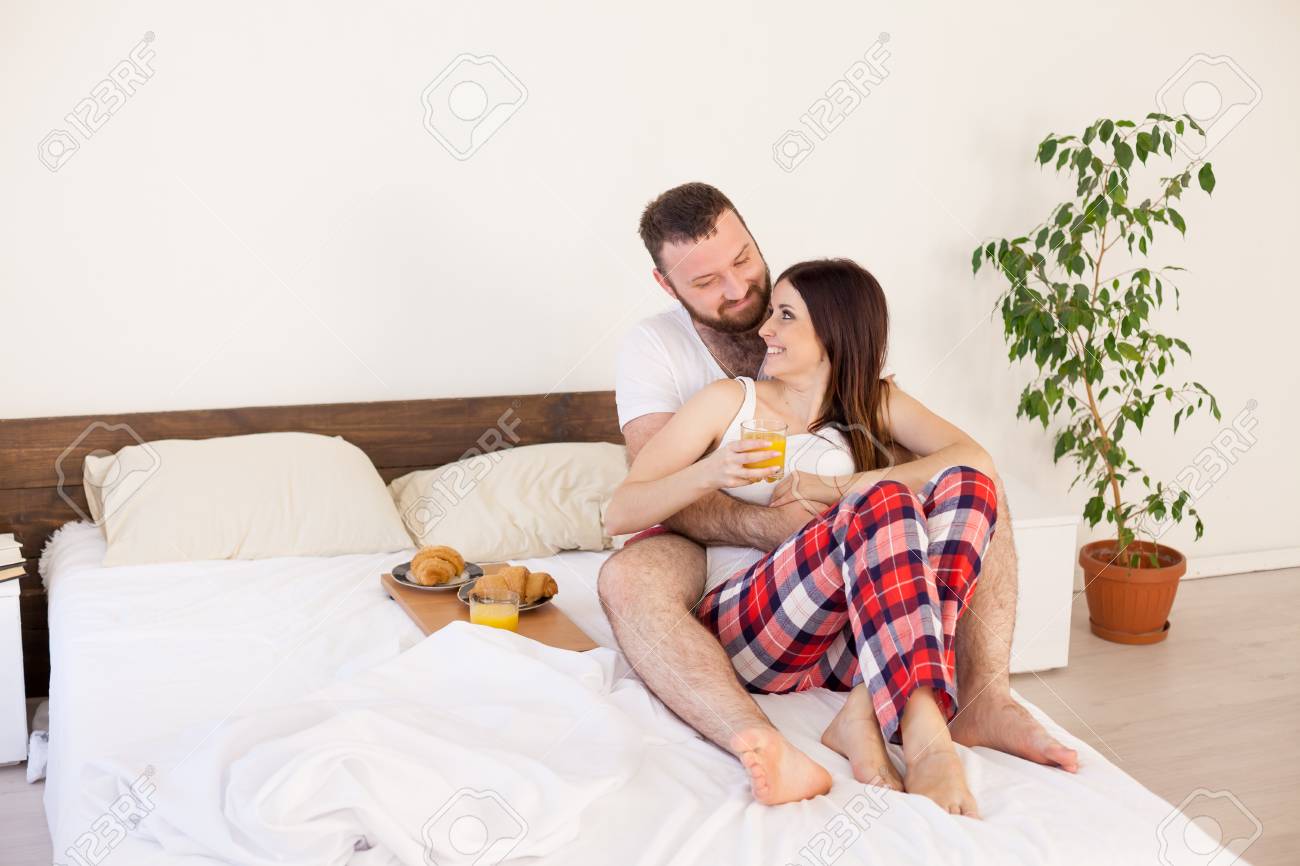 Husband And Wife Morning Breakfast In