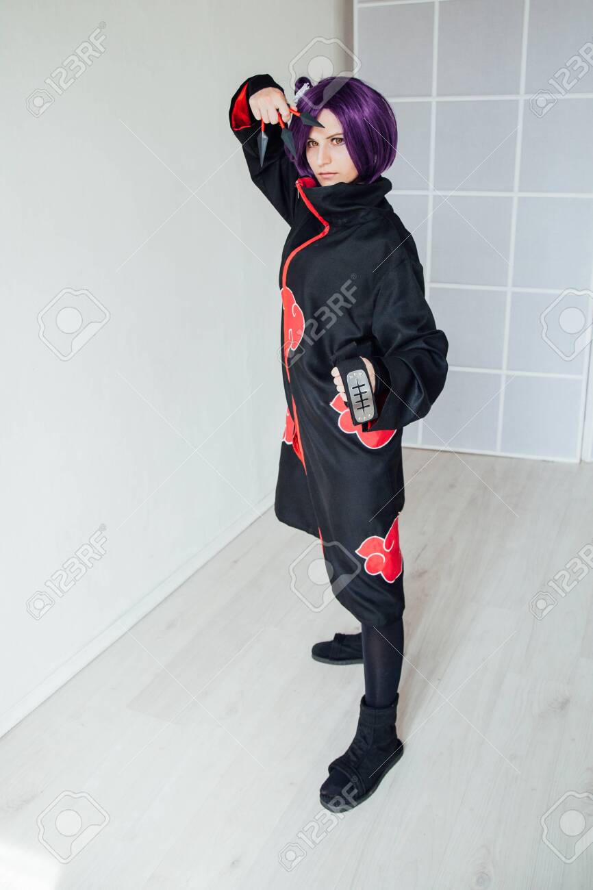 Young Woman In Japanese Anime Cosplay Holding Samurai Sword Stock Photo Picture And Royalty Free Image Image