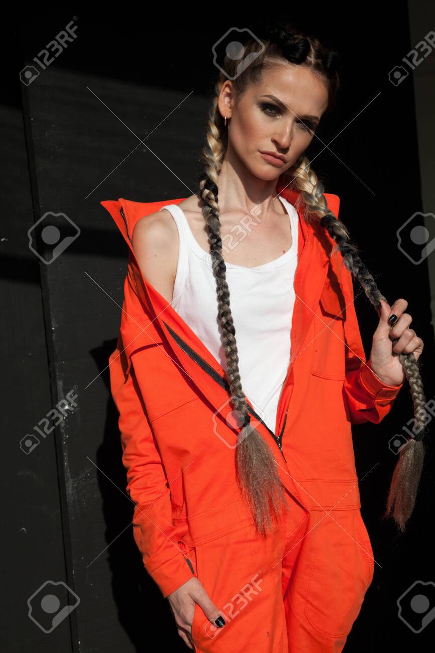 woman in orange jumpsuit