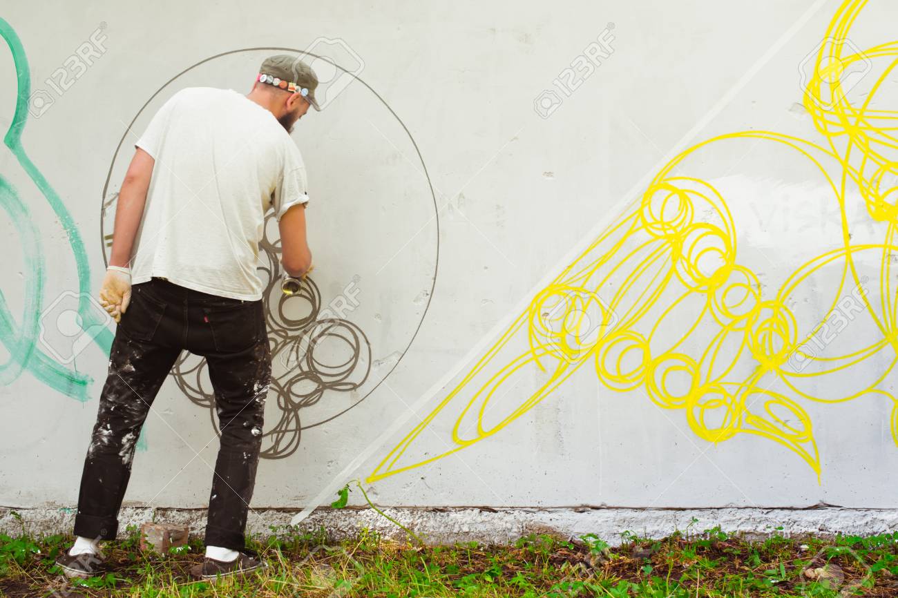 Graffiti on a fence. - 88298101 Graffiti on a fence. - 88298101