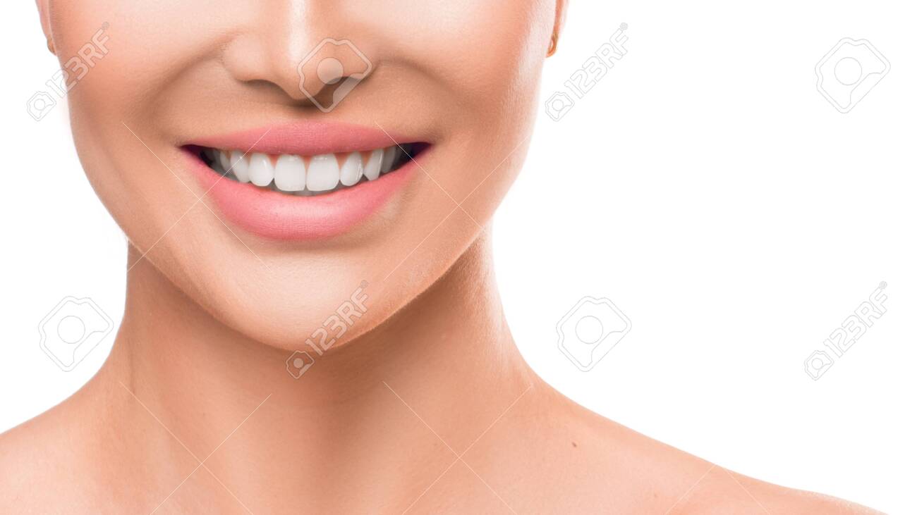 Close up photo of a woman smiling. Teeth whitening and dental health. - 130110771 Close up photo of a woman smiling. Teeth whitening and dental health. - 130110771
