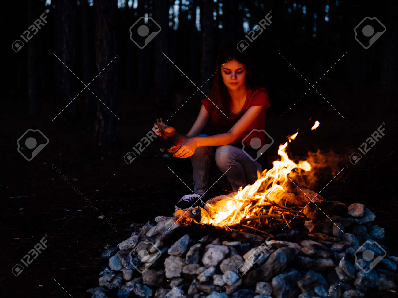 woman sitting in nature near the campfire rest forest - 171899898 woman sitting in nature near the campfire rest forest - 171899898