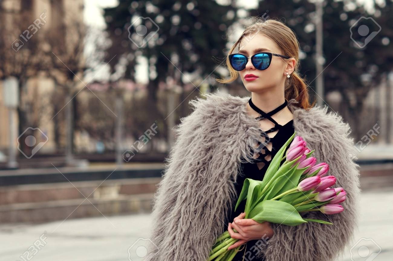 Stylish Red Hair Girl With Ponytail Wearing Short Black Dress
