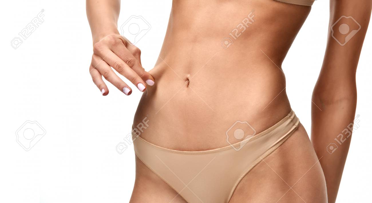 Beautiful Woman Body Abdomen With No Fat Healthy Eating And Weight Loss  Concept Isolated On White Background Stock Photo, Picture And Royalty Free  Image. Image 114748731.