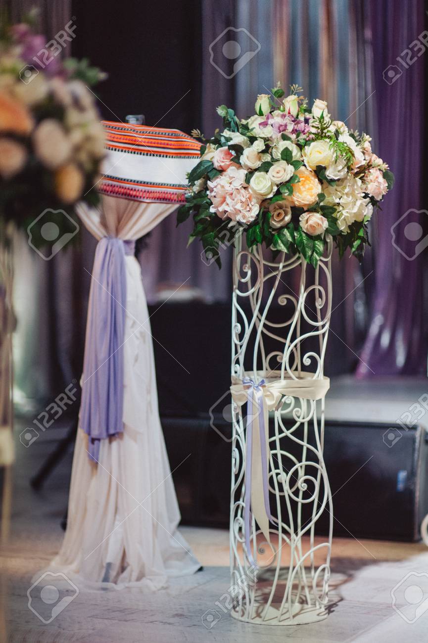 Original Wedding Floral Decoration In The Form Of Mini Vases
