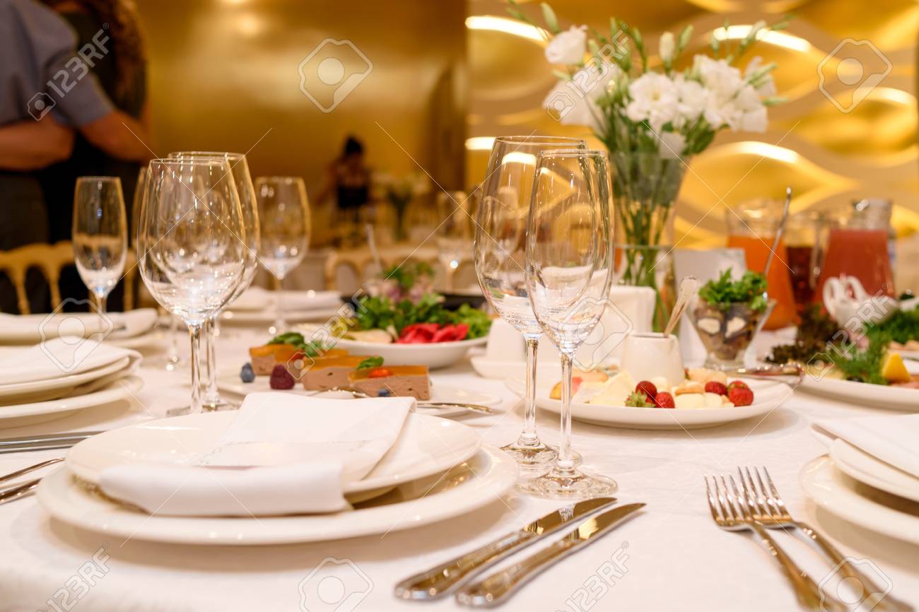 sparkling glassware stands on round table prepared for wedding wedding round table settings