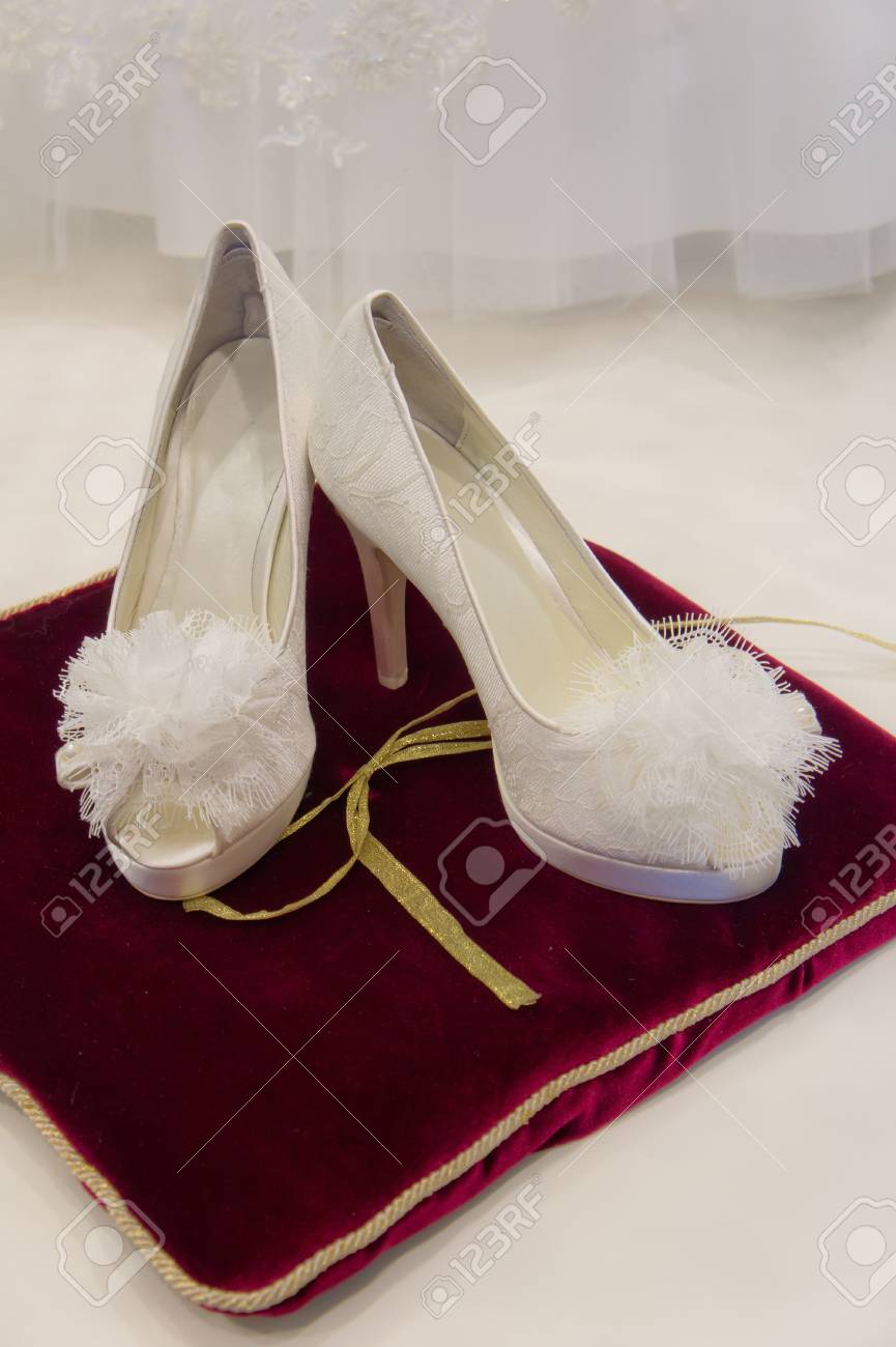 red and white wedding shoes