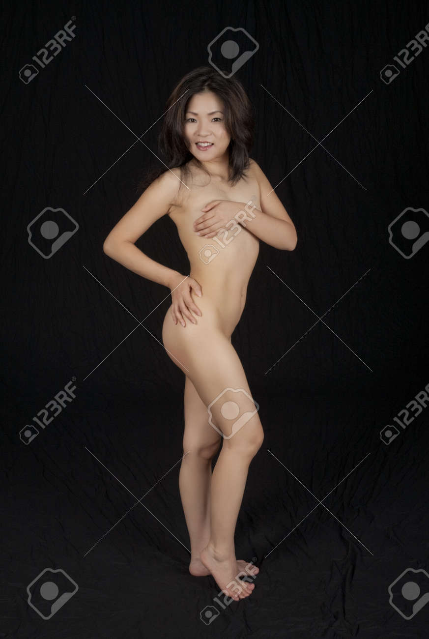 Beautiful and sexy Japanese woman posing nude and implied nude on a black background Stock Photo beautiful japanese wife nude - Beautiful and sexy Japanese woman posing nude and implied nude on a black background Stock Photo